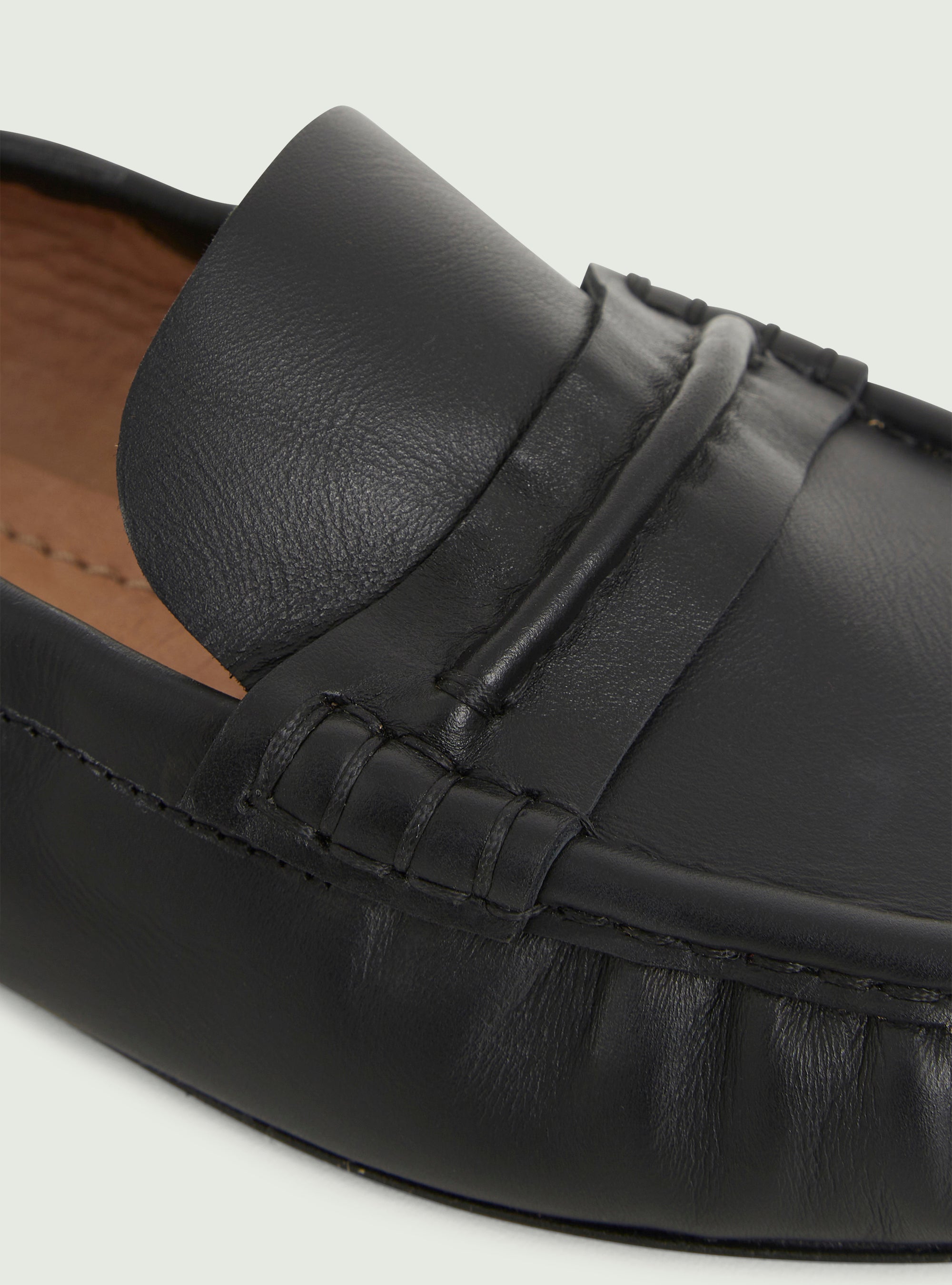 Black leather loafers