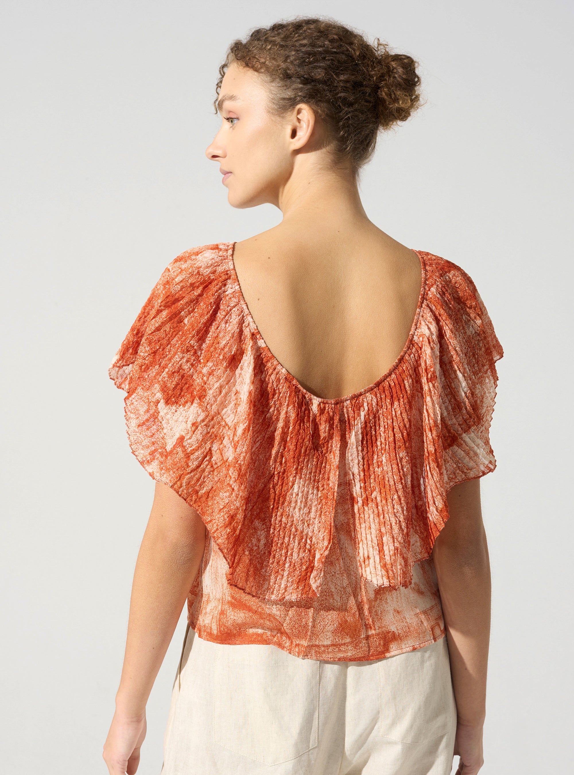Tank top with pleated ruffles