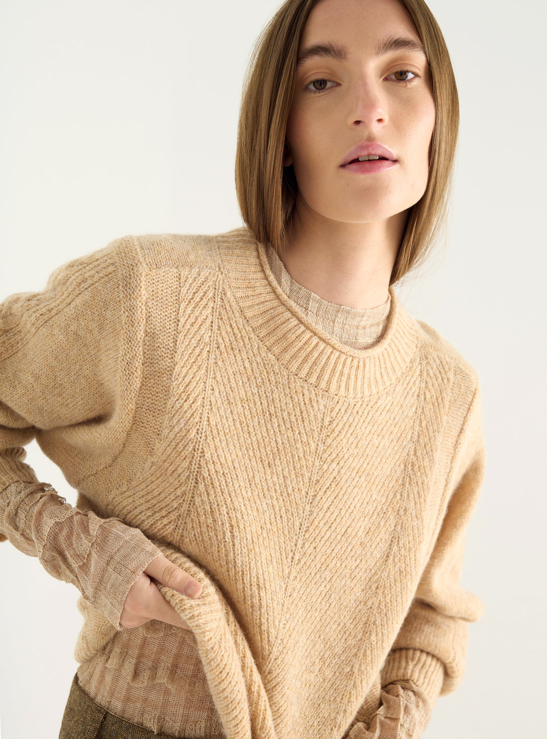 Jacquard wool sweater with worked sleeves – Straight cut