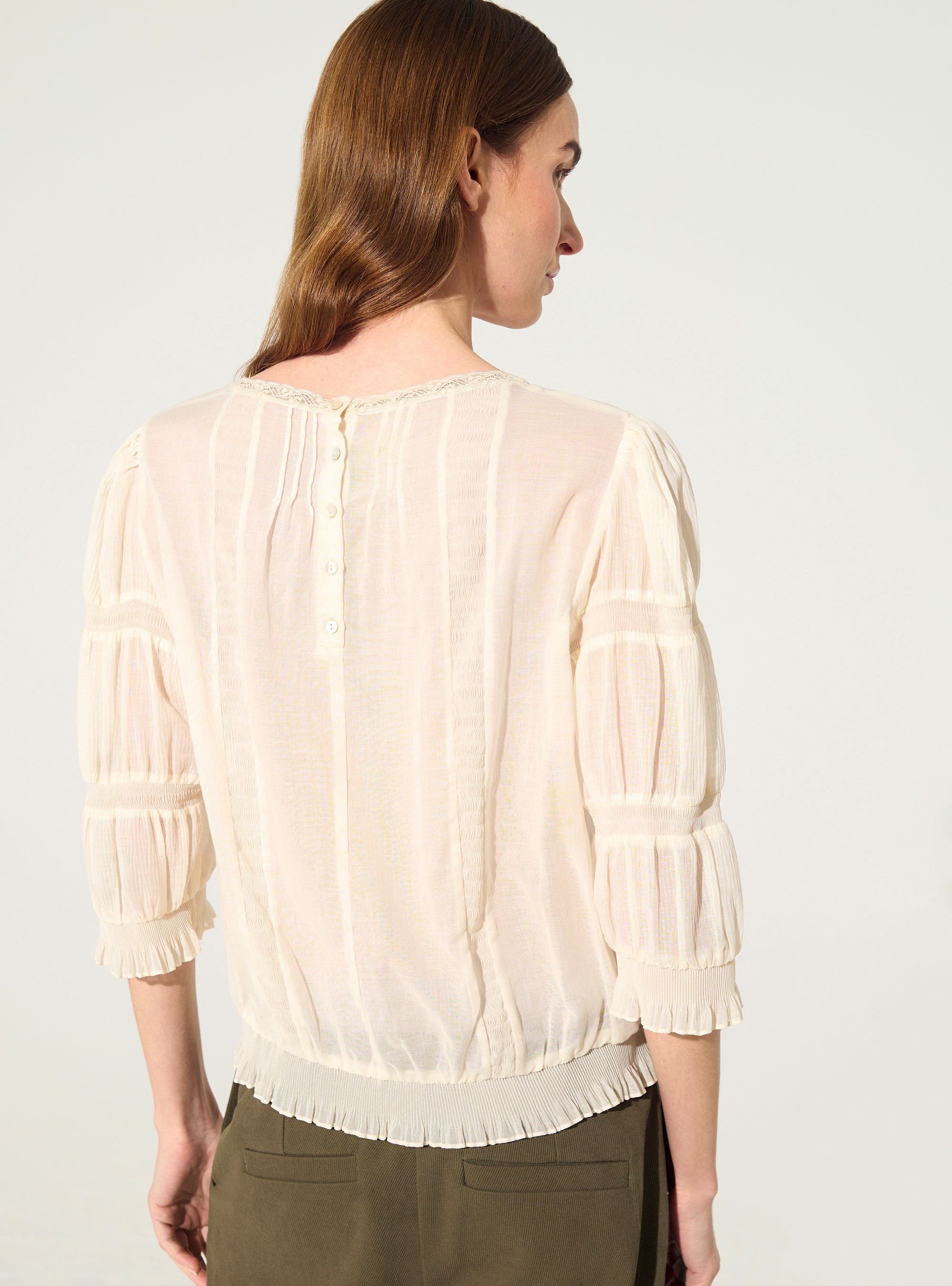 Pleated blouse and Calais-Caudry® lace
