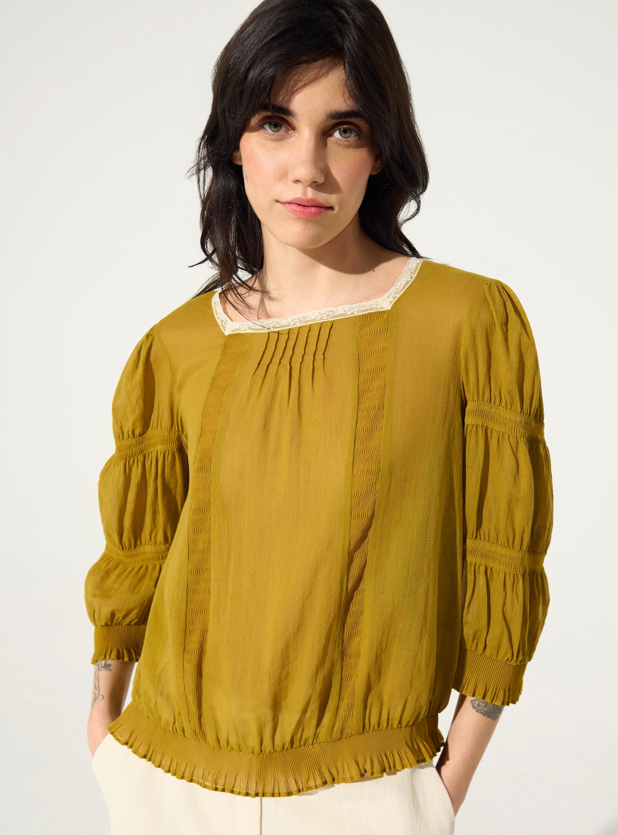 Pleated blouse and ochre yellow Calais-Caudry® lace
