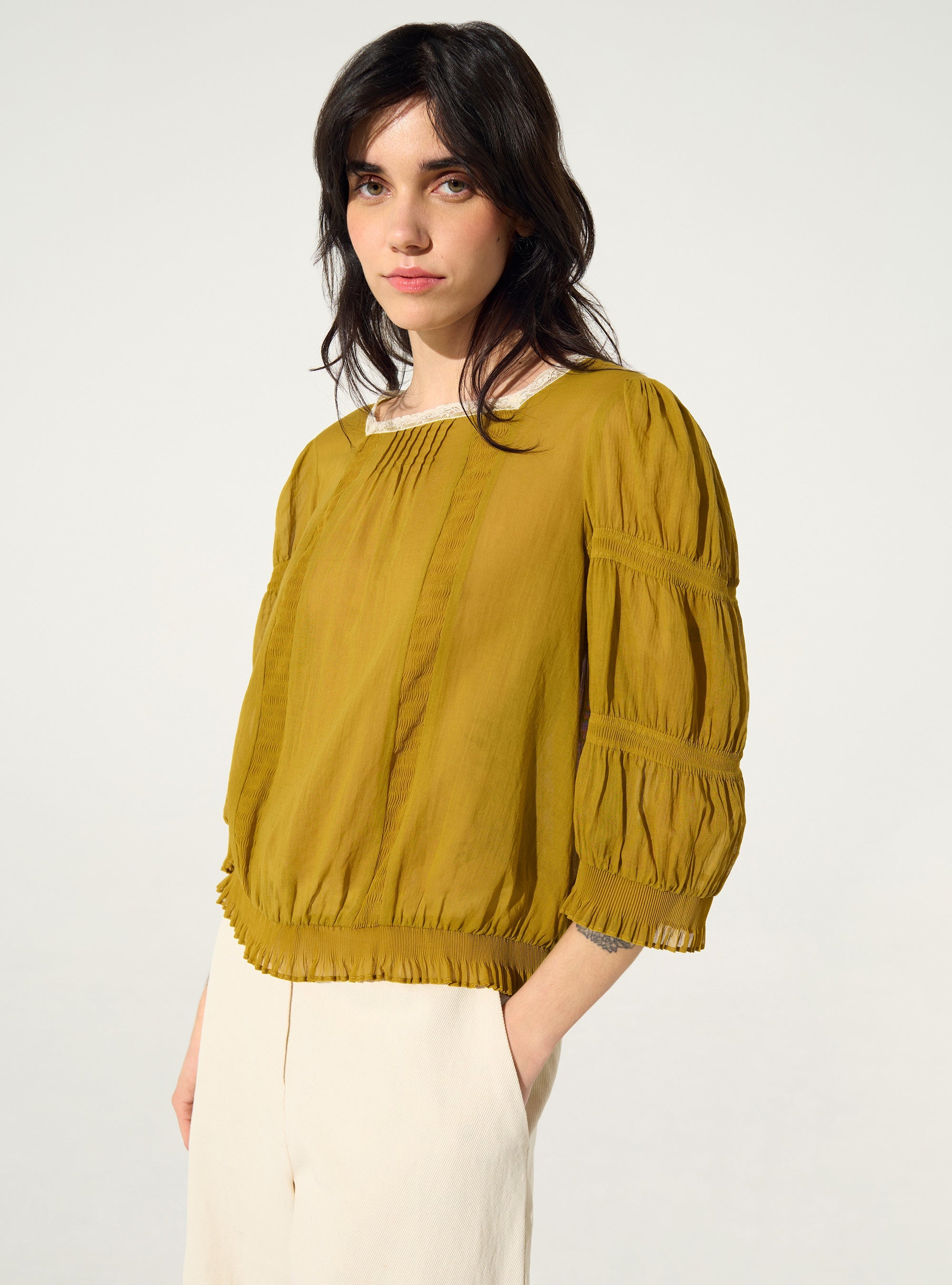 Pleated blouse and ochre yellow Calais-Caudry® lace