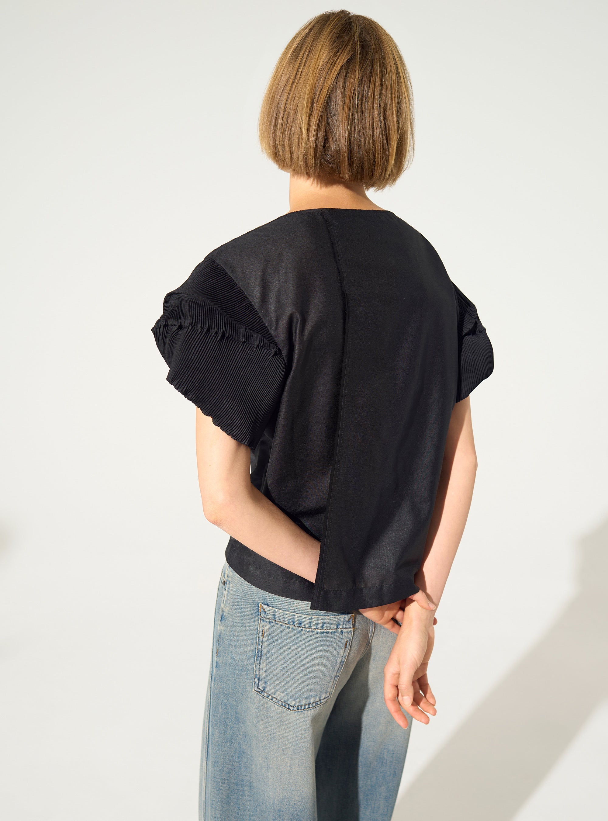 Black pleated blouse