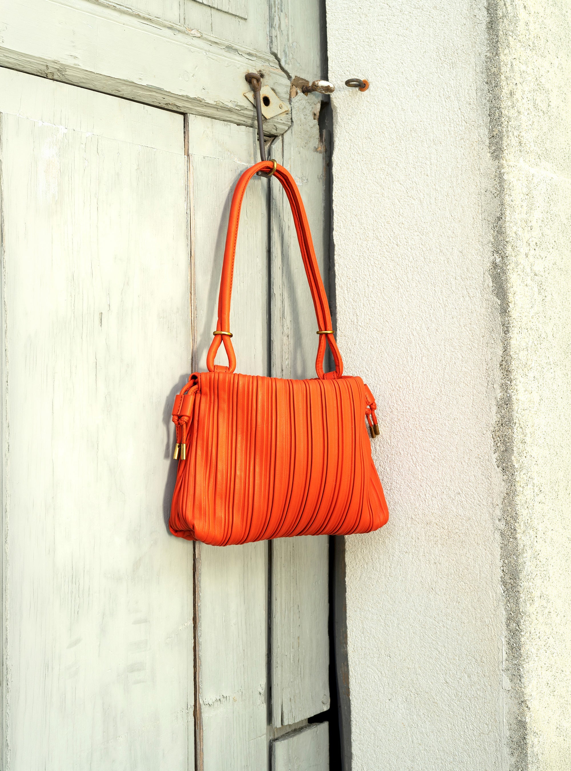Petit sac plissé en cuir rouge Cotélac