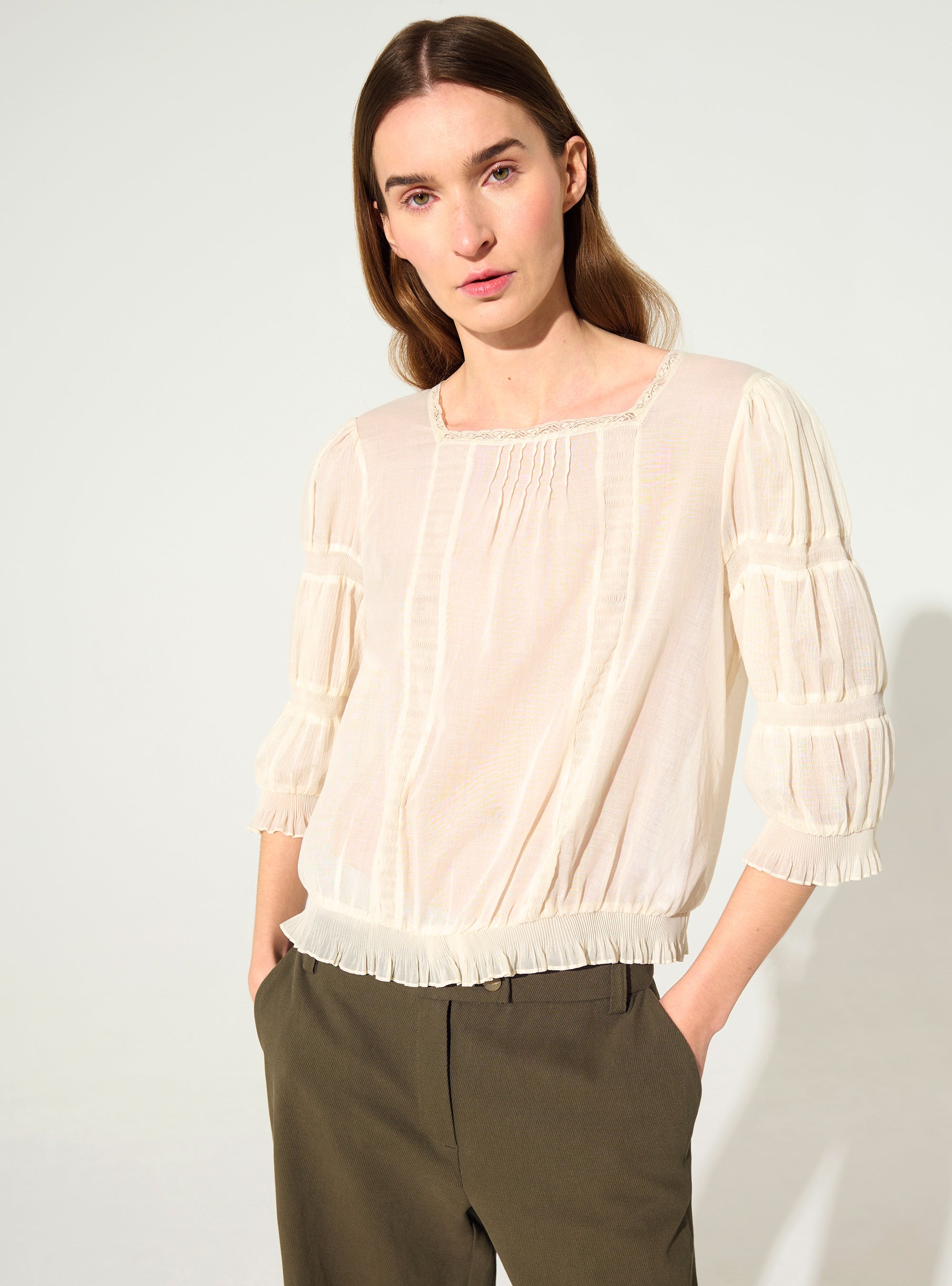 Pleated blouse and Calais-Caudry® lace