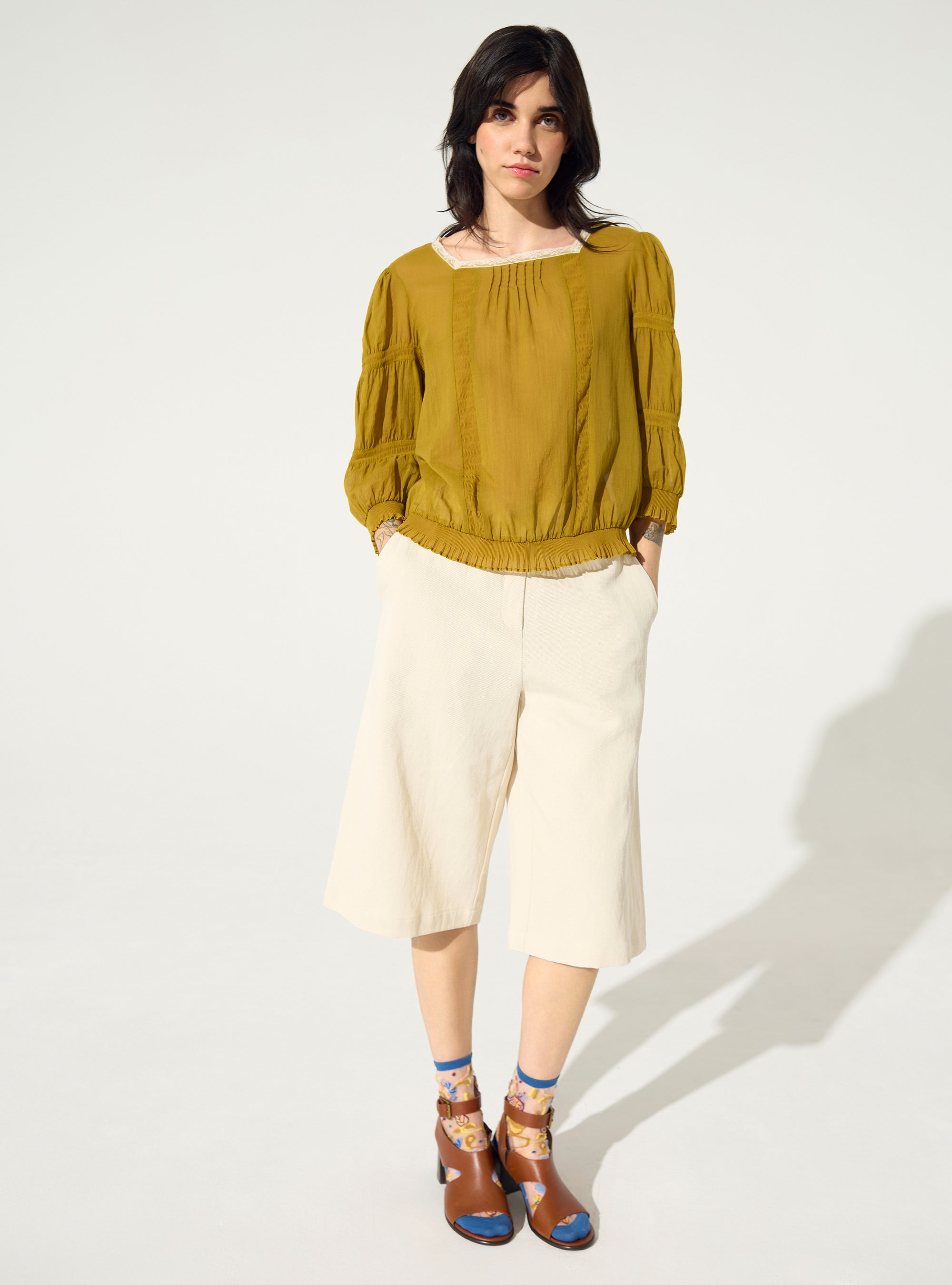 Pleated blouse and ochre yellow Calais-Caudry® lace