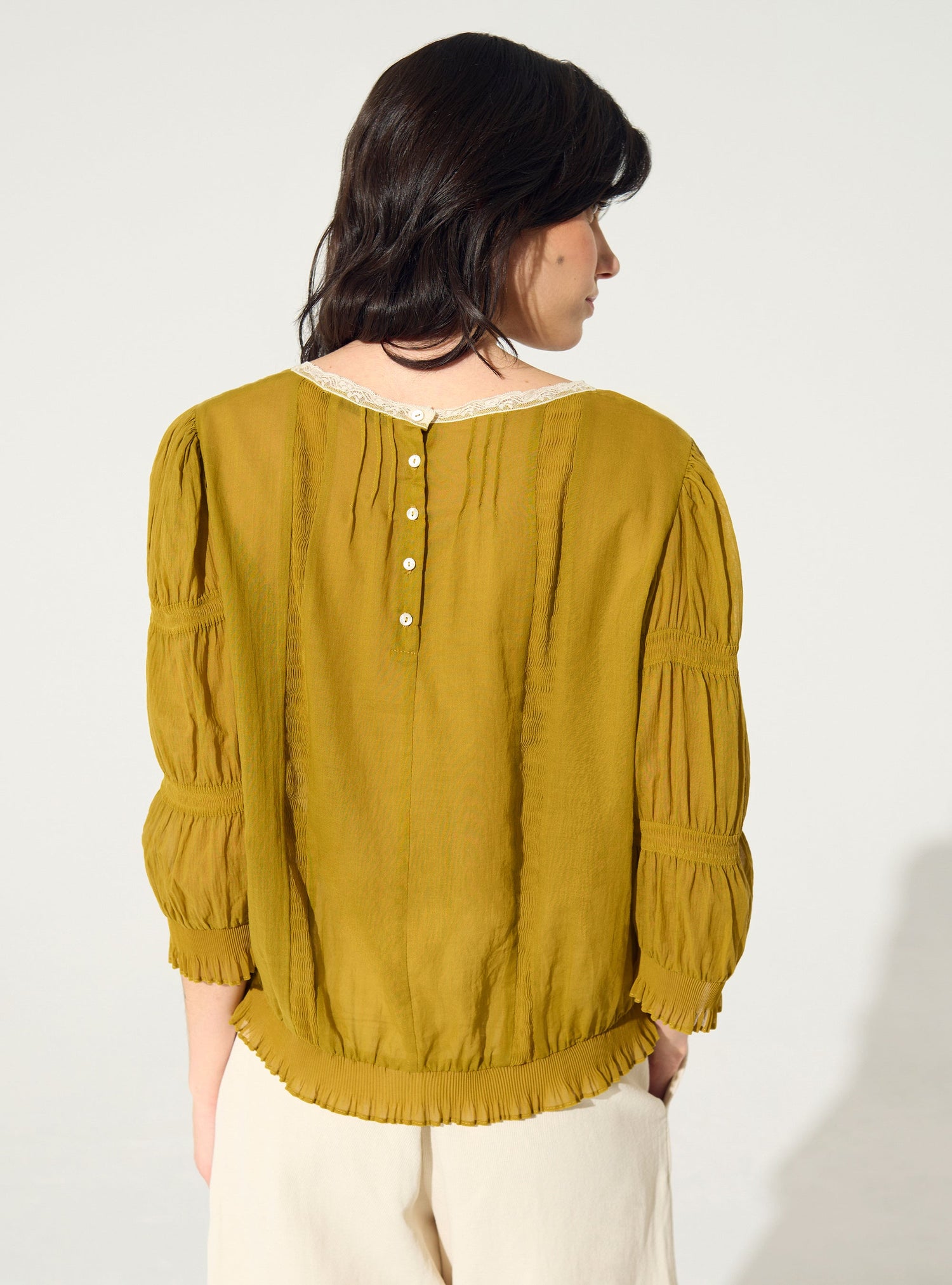 Pleated blouse and ochre yellow Calais-Caudry® lace