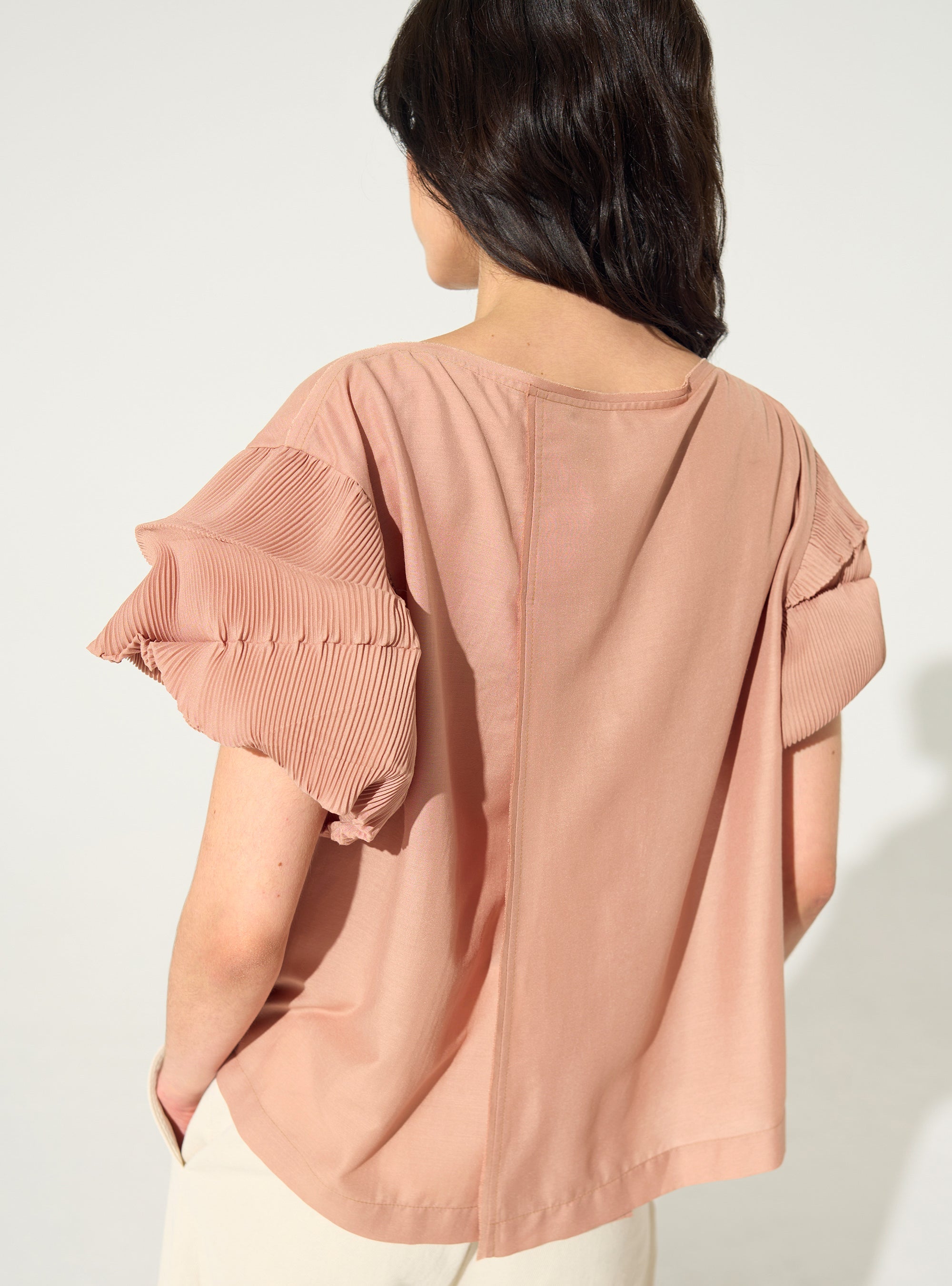Pink pleated blouse