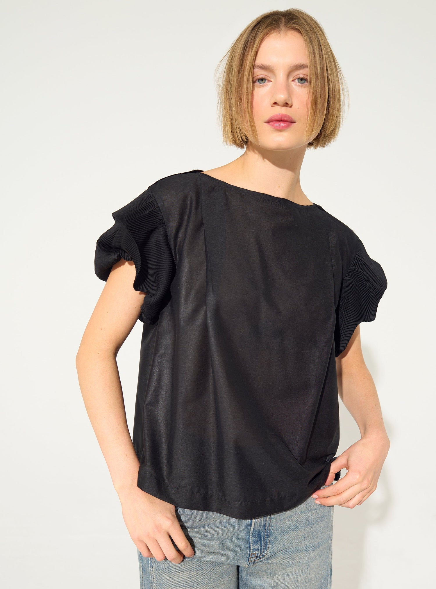 Black pleated blouse