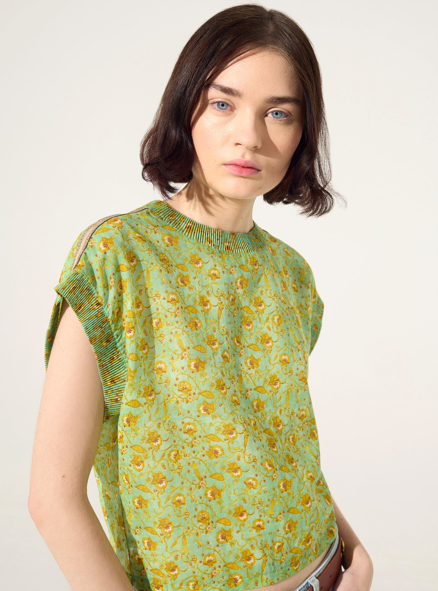 Fitted pleated printed blouse in green cotton