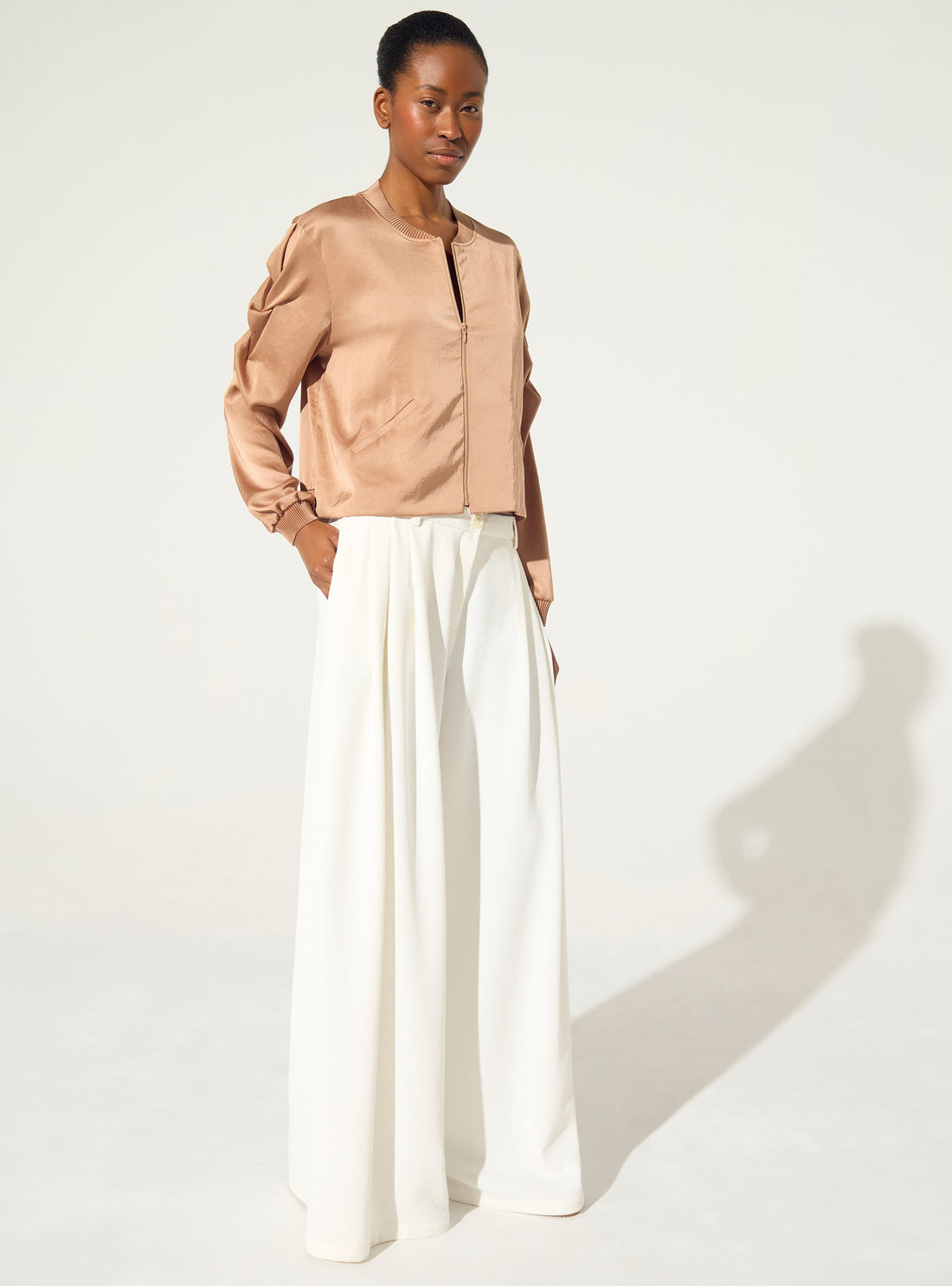 Wide-legged white trousers